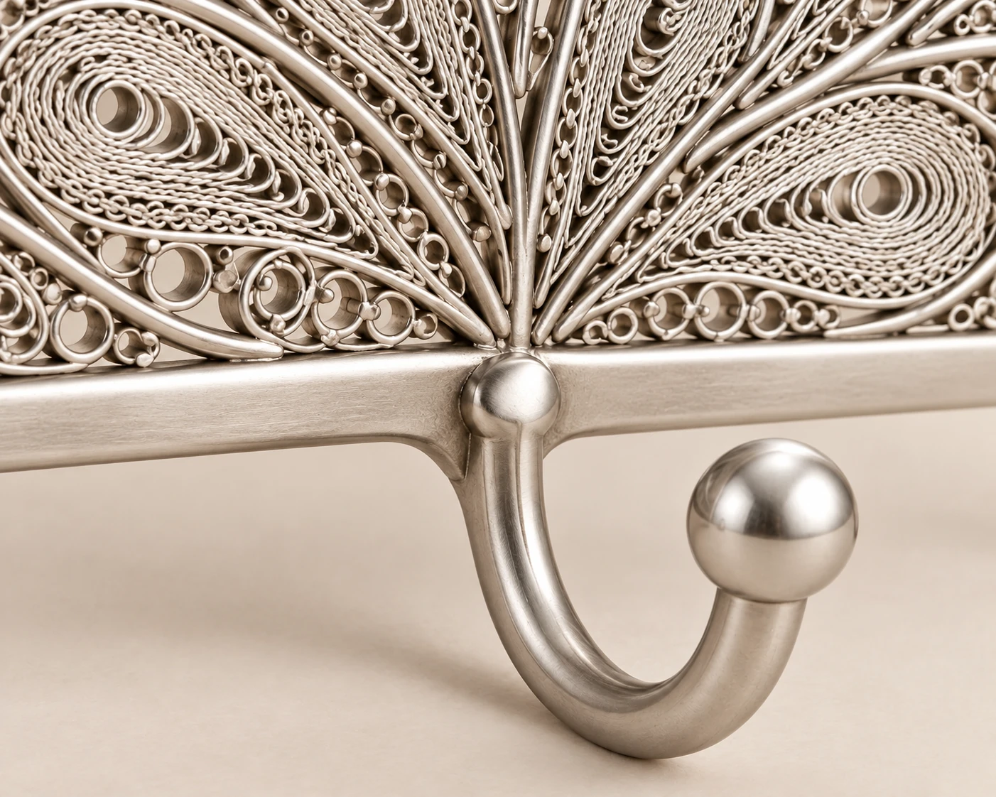 Concept detail of the leaves, spirals and joints of the three-hook filigree organiser