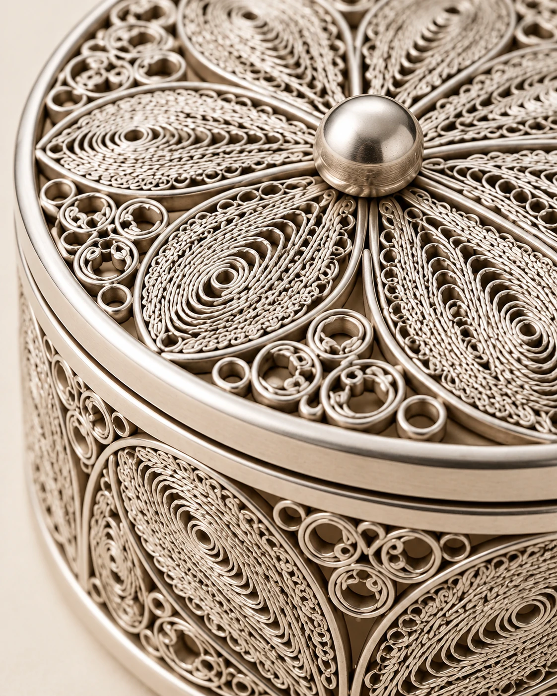 Concept detail of the spirals and lid knob of the round filigree jewellery box
