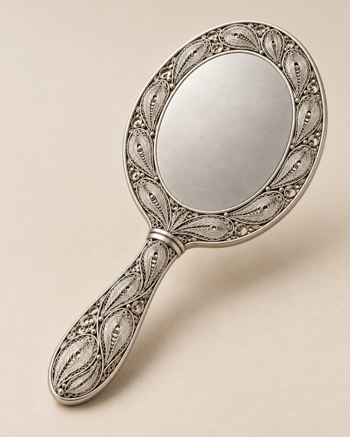 Proposed functional view of the filigree hand mirror, backing and handle joint