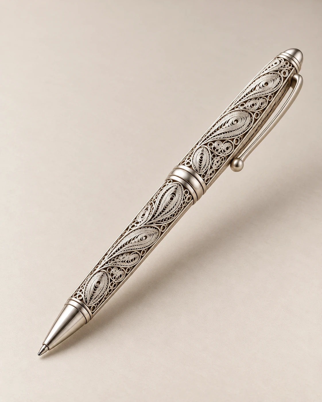 Proposed functional view of the filigree ballpoint pen, its refill and assembly components